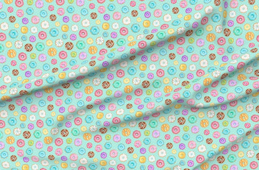 Scattered Rainbow Donuts On Mint Spotty