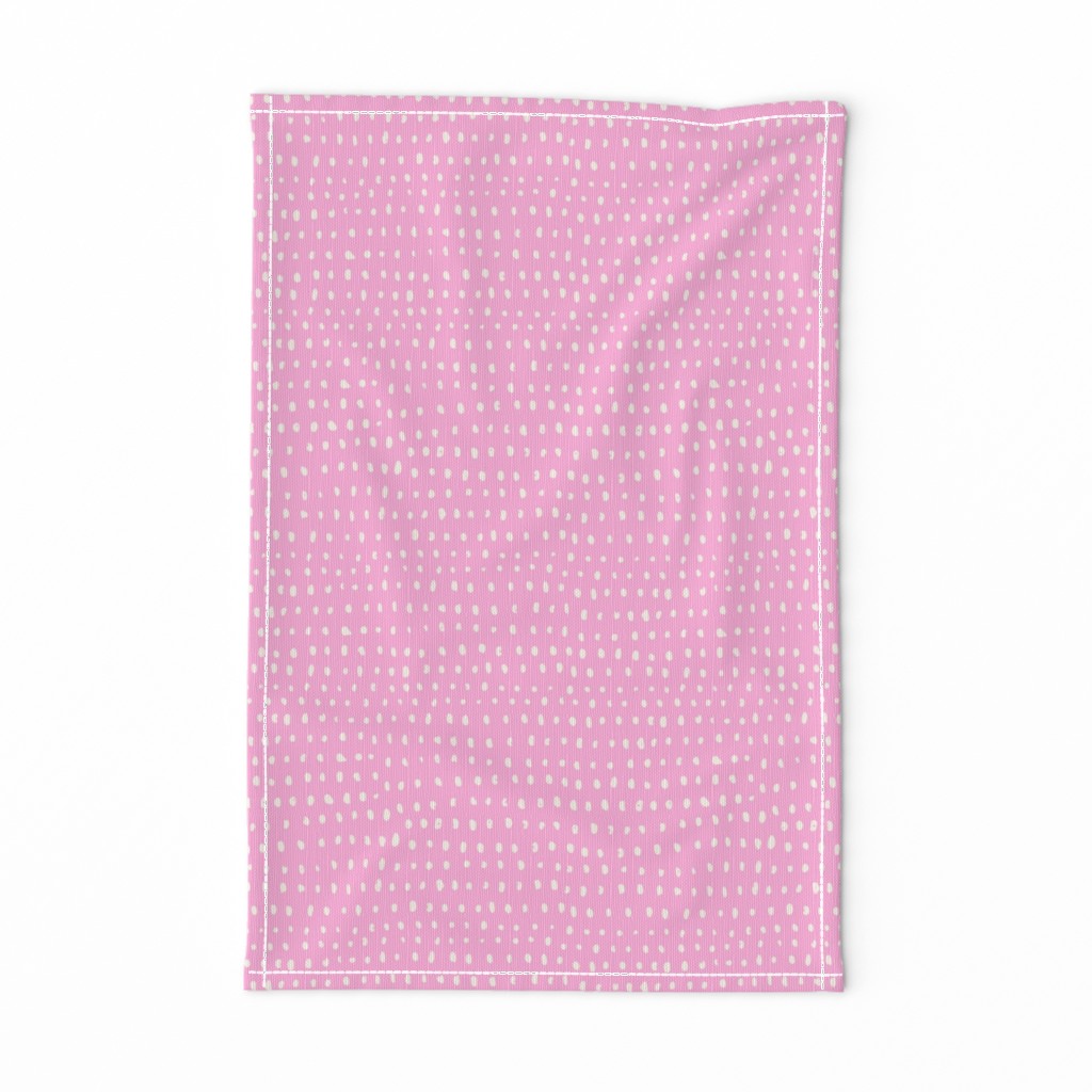 hand drawn cream dots on bright pink