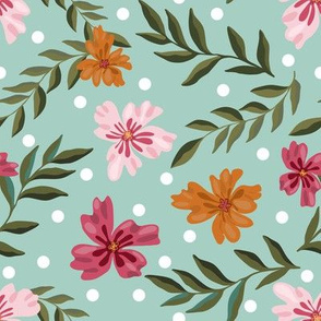 Pink and mustard flowers on teal with white dots