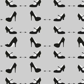 High heels in black and white arrow.
