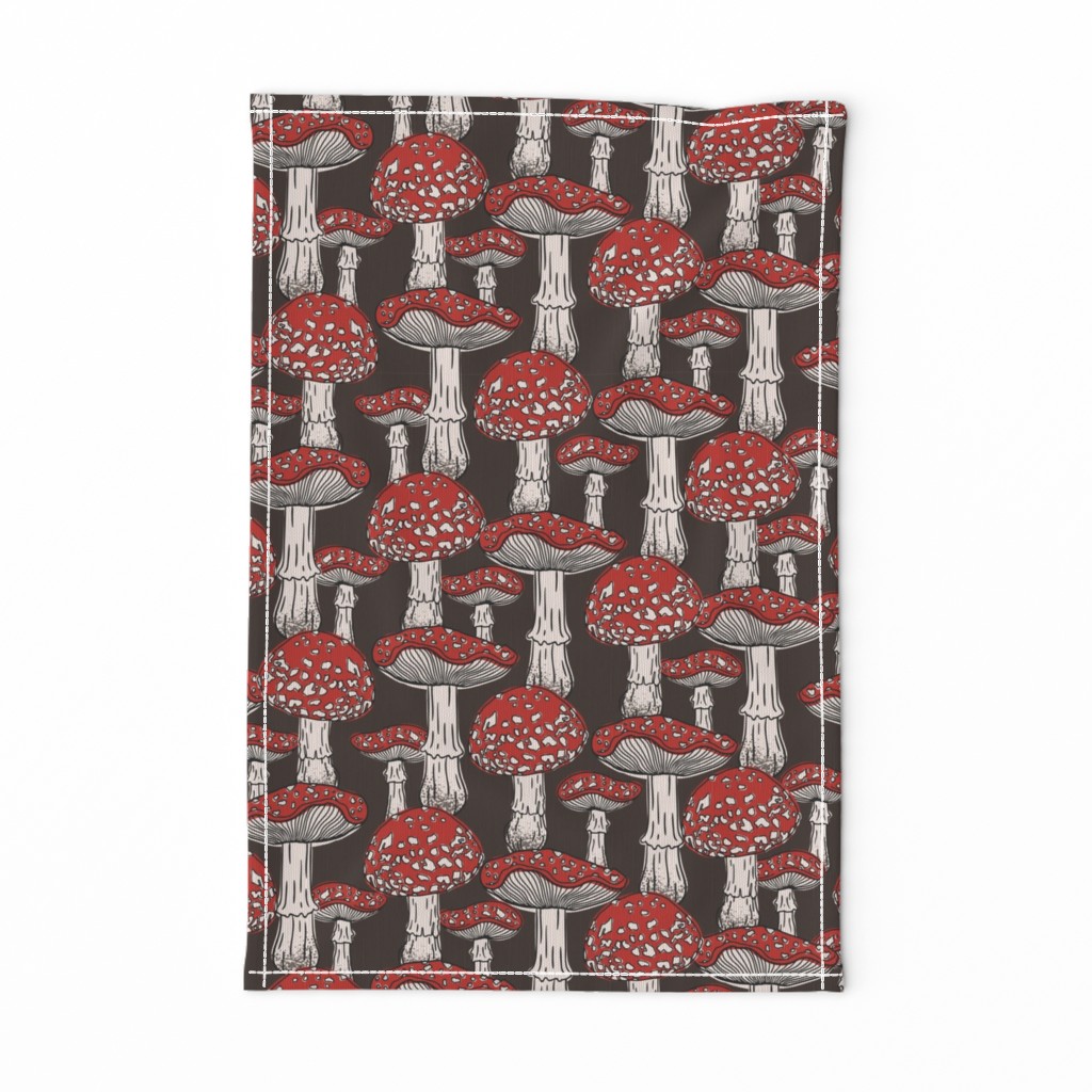 Pattern with red fly agaric on brown background