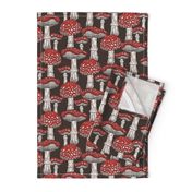 Pattern with red fly agaric on brown background