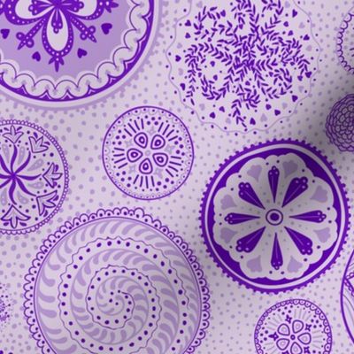 Hand-drawn purple mandala chakra wheels
