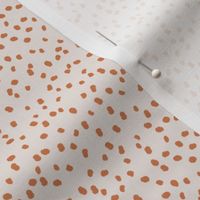 ditsy micro dots_almond and terracotta