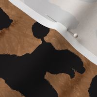 Black Poodle Silhouettes on Chocolate