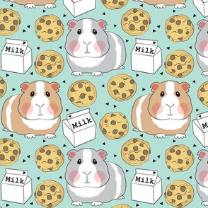 large pastel guinea pigs with milk and cookies