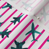 Emerald airplanes with pink stripes - turquoise air planes for travel inspiration 