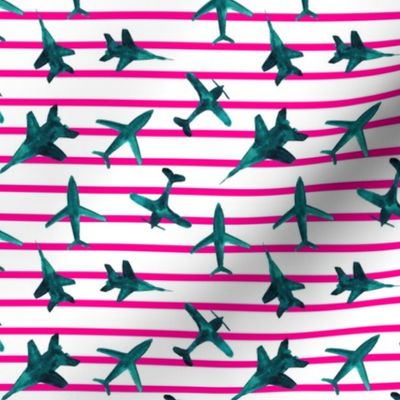 Emerald airplanes with pink stripes - turquoise air planes for travel inspiration 