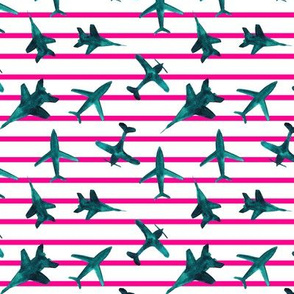 Emerald airplanes with pink stripes - turquoise air planes for travel inspiration 