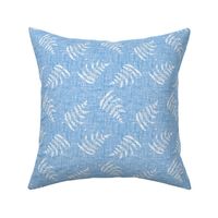 blue fern leaves on blue linen