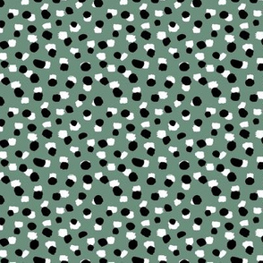 Abstract boho Dalmatian spots animal print spots and dots ink texture minimal nursery neutral green black and white