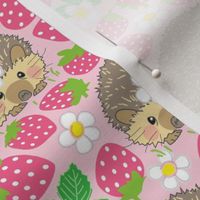 large hedgehogs in a pink strawberry patch