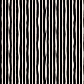 Boho strokes and circus stripes modern Scandinavian style minimal vertical lines basic neutral nursery off white black monochrome