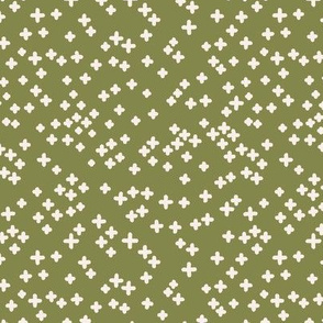 Hand drawn crosses on the green background.