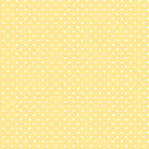 White dots on a yellow background