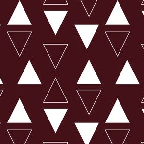 white triangles on maroon 1 inch