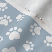 Small scale // Paw prints // pastel blue background white animal foot prints
