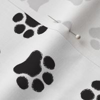 large black pawprints on white