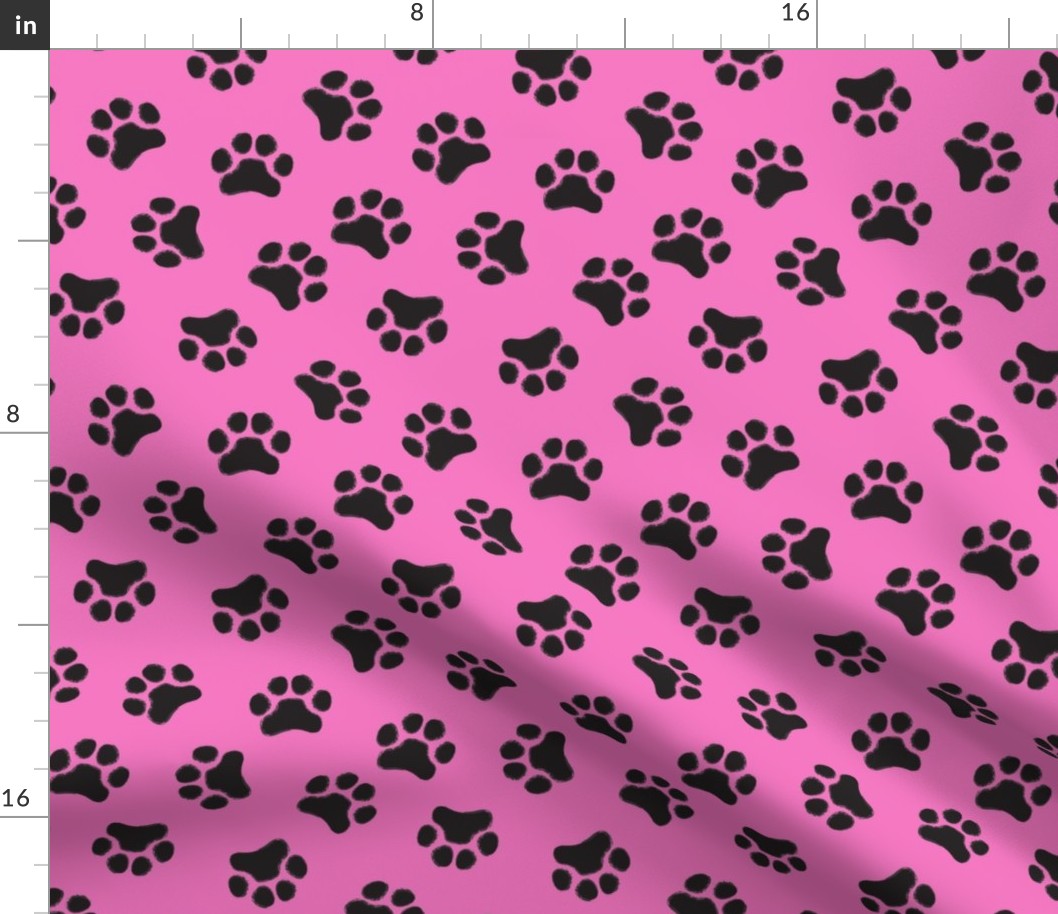 large black paw prints on hot pink