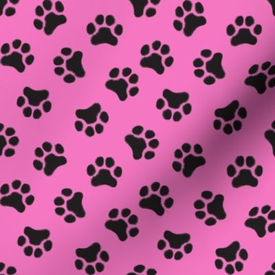 small black pawprints on hot pink