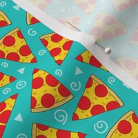 small pepperoni pizza slices on teal