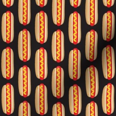 vertical hot dogs on black