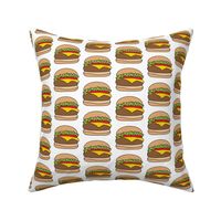 large cheeseburgers with black outlines