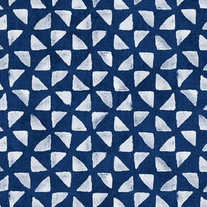 Block Print Triangles on Indigo Blue | Pinwheel triangles from hand carved block, white on deep navy blue.