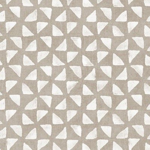 Block Print Triangles on Ecru | Pinwheel triangles from hand carved block, white on sandy beige.