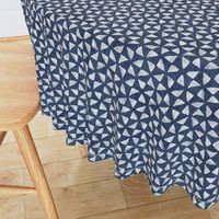Block Print Triangles on Blue Grey Denim | Pinwheel triangles from hand carved block, white on faded denim.