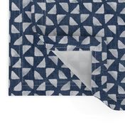 Block Print Triangles on Blue Grey Denim | Pinwheel triangles from hand carved block, white on faded denim.