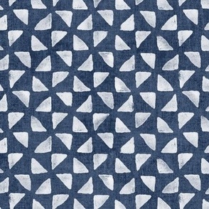 Block Print Triangles on Blue Grey Denim | Pinwheel triangles from hand carved block, white on faded denim.
