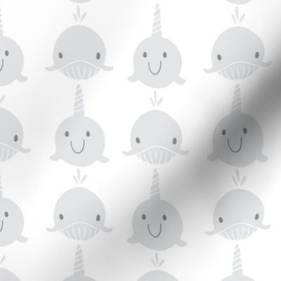 Whales and narwhals in grey