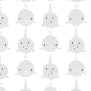 Whales and narwhals in grey