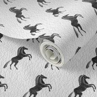 Black Horses on white Leather