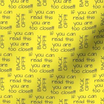 if you can read this you are too close gray on yellow