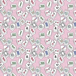 Mini Scale Mahjong Tiles on Pink Swirls Background
