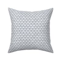 Block Print Pebble Beach in Grey | Hand block printed pattern of beach pebbles in grey and white, beach fabric for totes, wraps and swimwear.