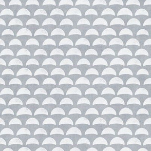 Block Print Pebble Beach in Grey | Hand block printed pattern of beach pebbles in grey and white, beach fabric for totes, wraps and swimwear.