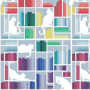 Small scale // Rainbow bookshelf // pastel blue background white book shelves and library cats