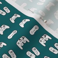 Game Controllers on Deep Teal