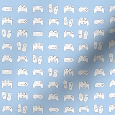 Game Controllers on Pastel Blue