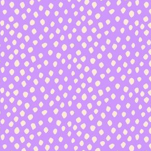 Cream spots on light purple
