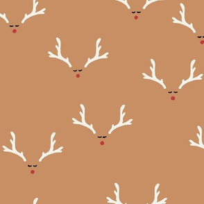 Reindeer antlers on golden yellow red nose deer heads festive Christmas