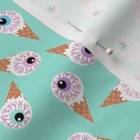 halloween eye icecream fabric - creepy cute fabric - pastel mint