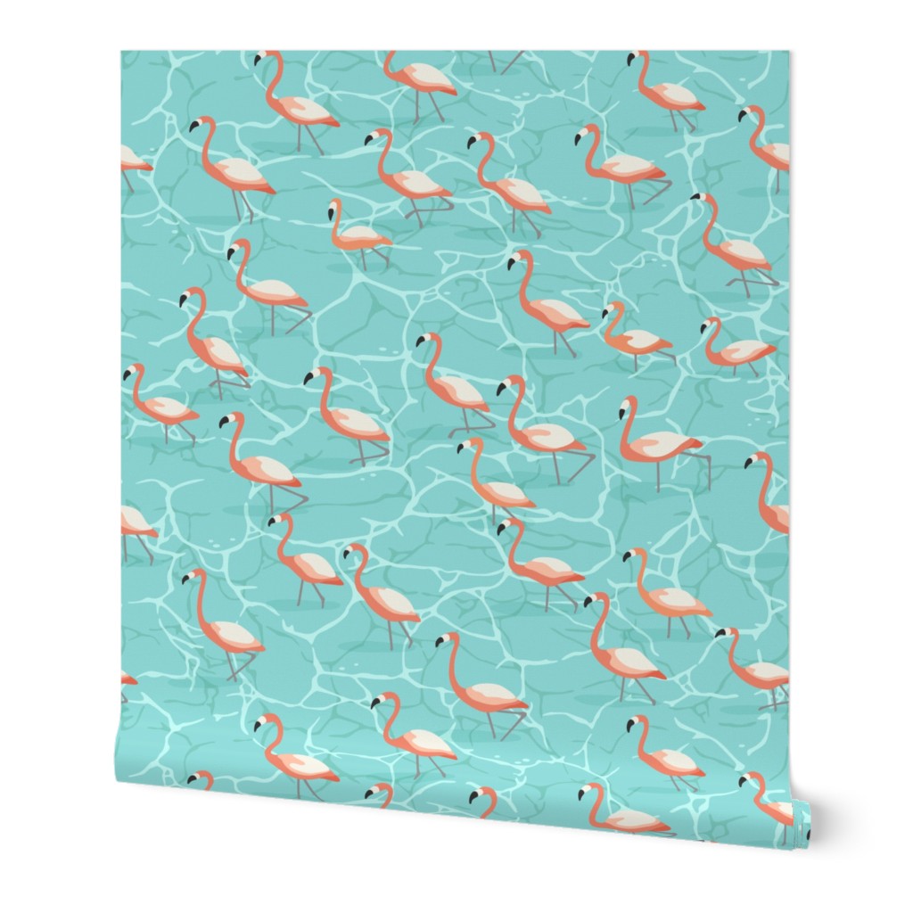 Shining flamingo beads in the turquoise water