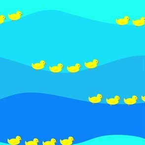 duckies paddling on graphic water waves