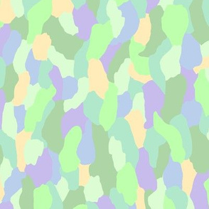 Abstract shape pattern in green, purple and yellow