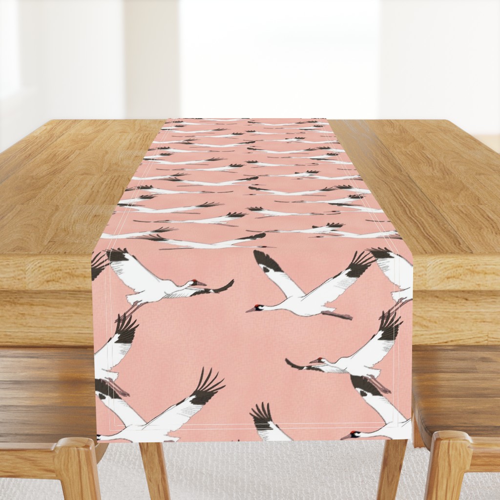 Large scale cranes on blush pink