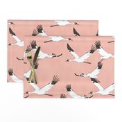 Large scale cranes on blush pink